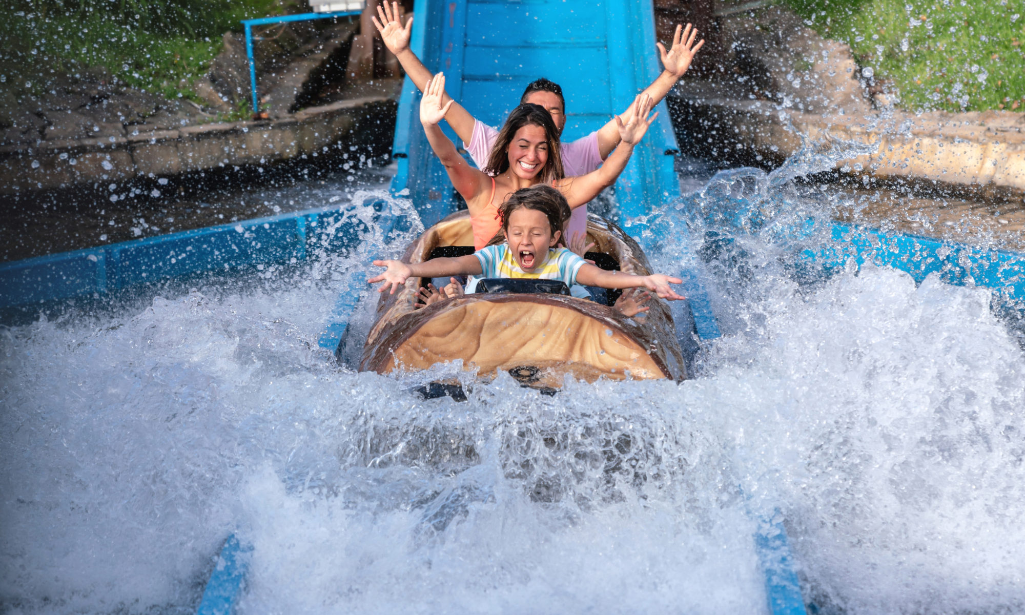 Family riding the tube chute ride at Schlitterbahn New Braunfels
